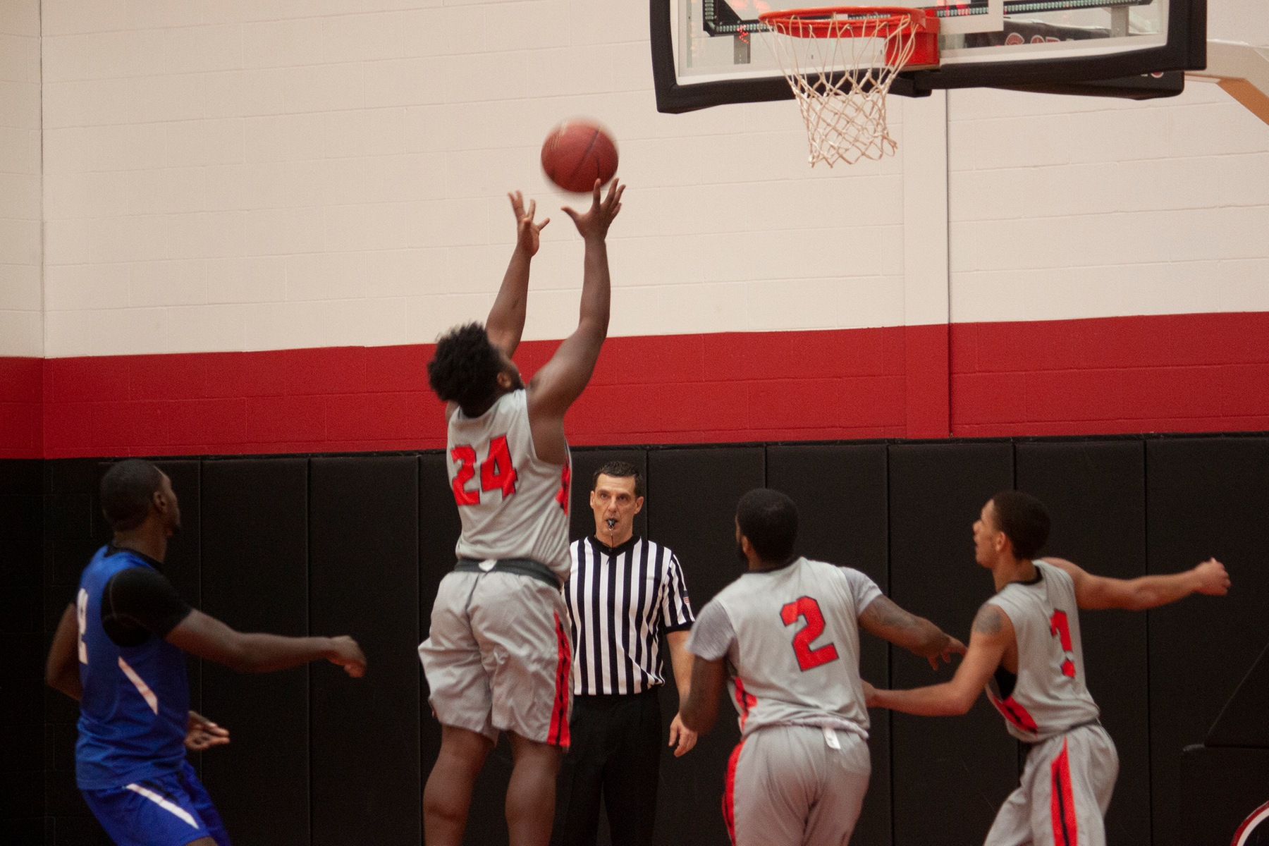 Cayuga's Lutrell Vivians grabs a rebound against Fulton-Montgomery Community College earlier this season. Photo courtesy of The Cayuga Collegian.