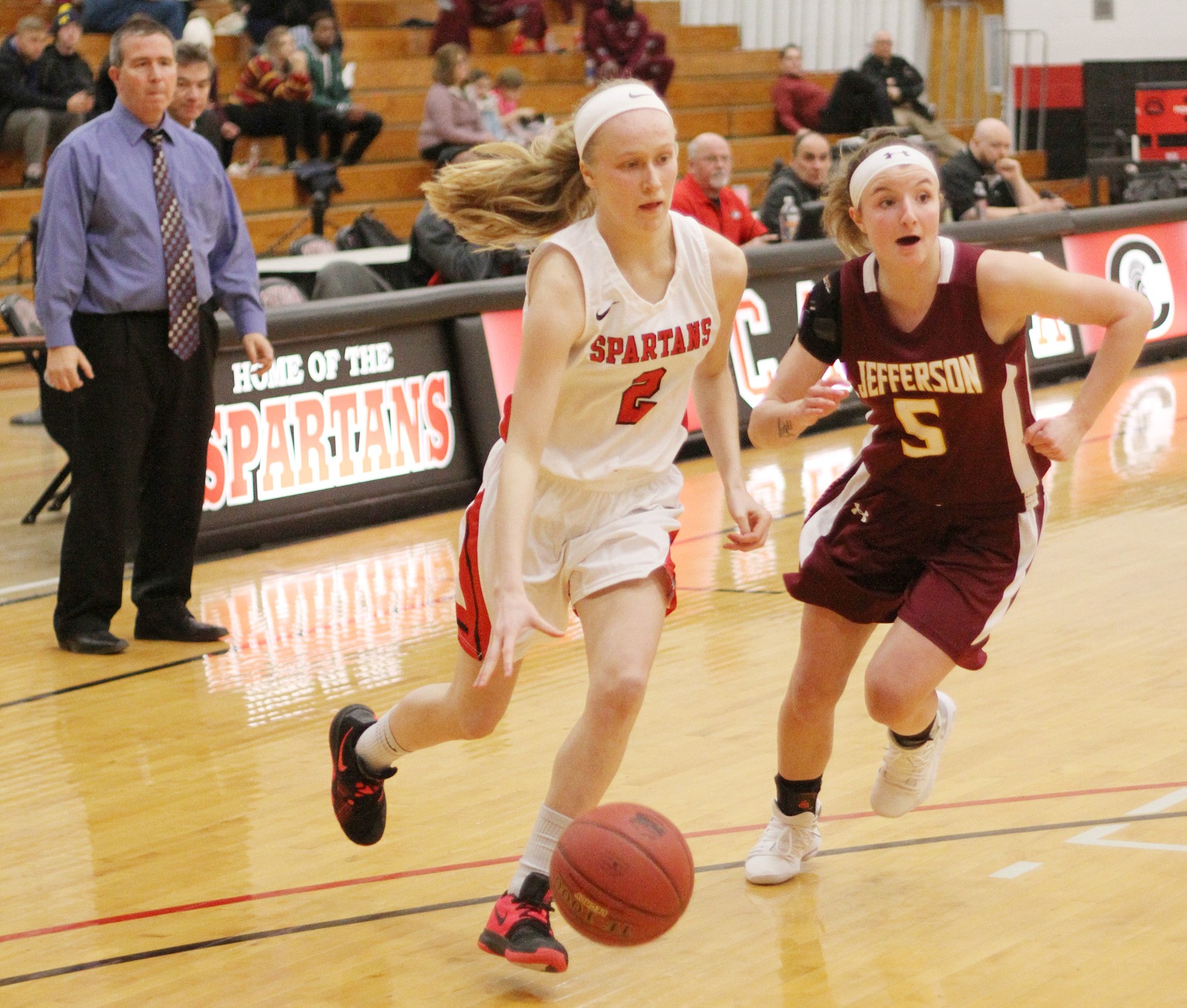 Erica Helzer was one of two Spartans who scored 13 points against Corning Community College.