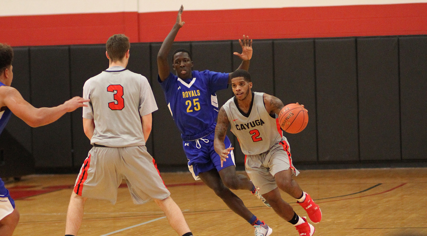 Stanley Beato, right, had 16 points and 10 rebounds for Cayuga in their 78-71 win over Tompkins Cortland.